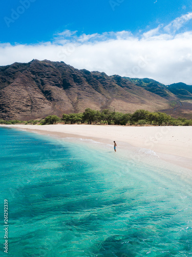 Tropical paradise beach with white sand and mountain background travel tourism wide panorama background. Hawaiian beach. Oahu.