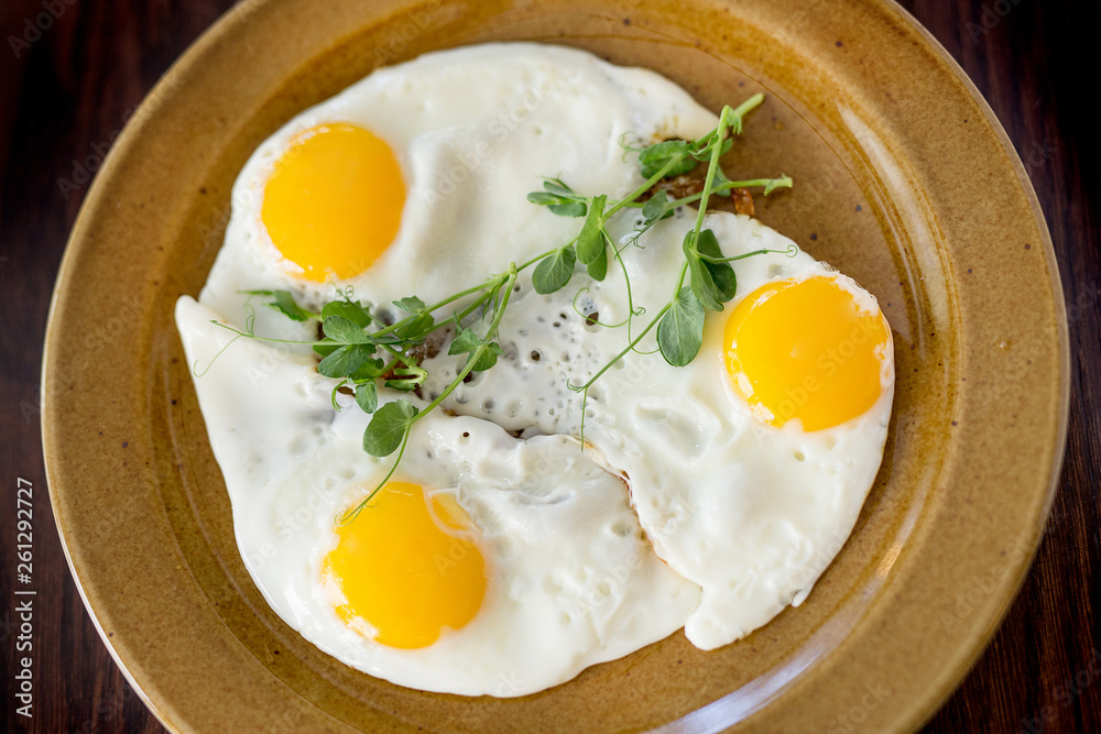 Scrambled eggs for breakfast from three eggs. Fried eggs. Scrambled eggs for breakfast from three eggs. Fried eggs.