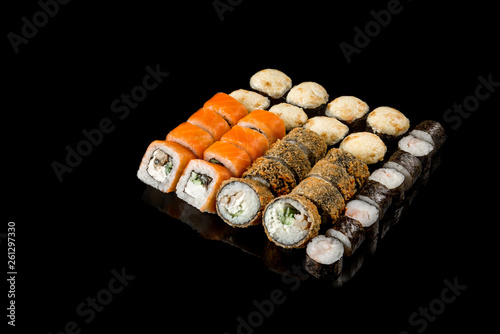 large set of rolls of fish and vegetables. Japanese food
