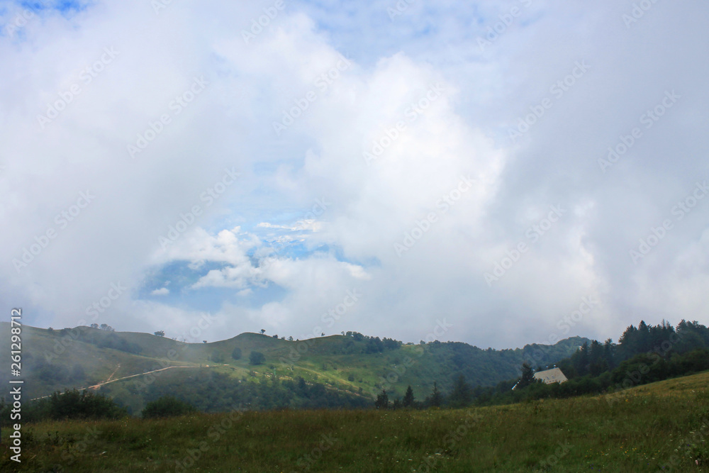 Low clouds on the mountain Mottarone, Italy