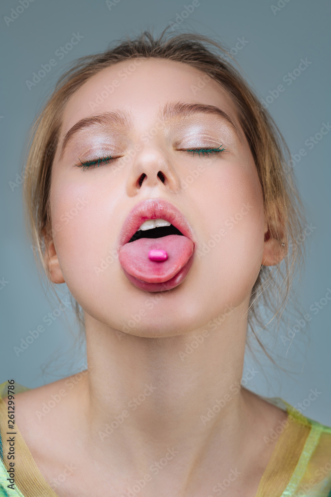 Fair-haired model with natural makeup posing with open mouth Fair-haired model with natural makeup posing with open mouth