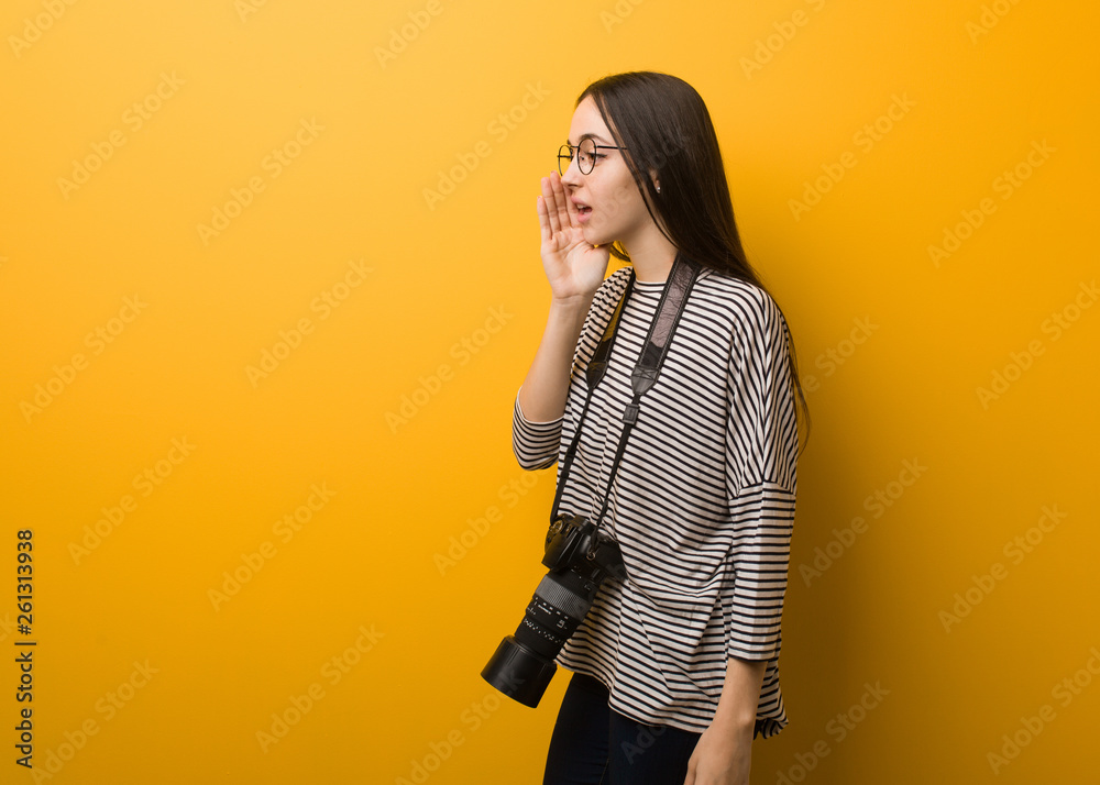 Young photographer woman whispering gossip undertone Young photographer woman whispering gossip undertone