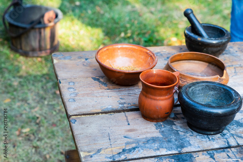 set clay dishes natural eco pair of plates deep bowl mortar black jug herbalist counter © Kai Beercrafter