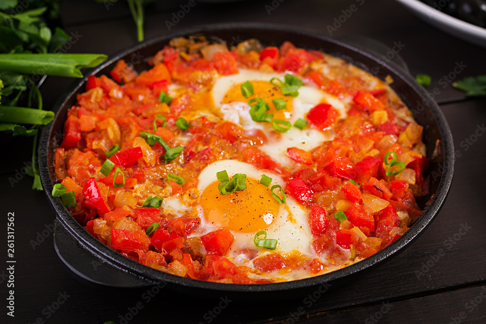 Turkish Breakfast - shakshuka, olives, cheese and fruit. Rich brunch. Turkish Breakfast - shakshuka, olives, cheese and fruit. Rich brunch.