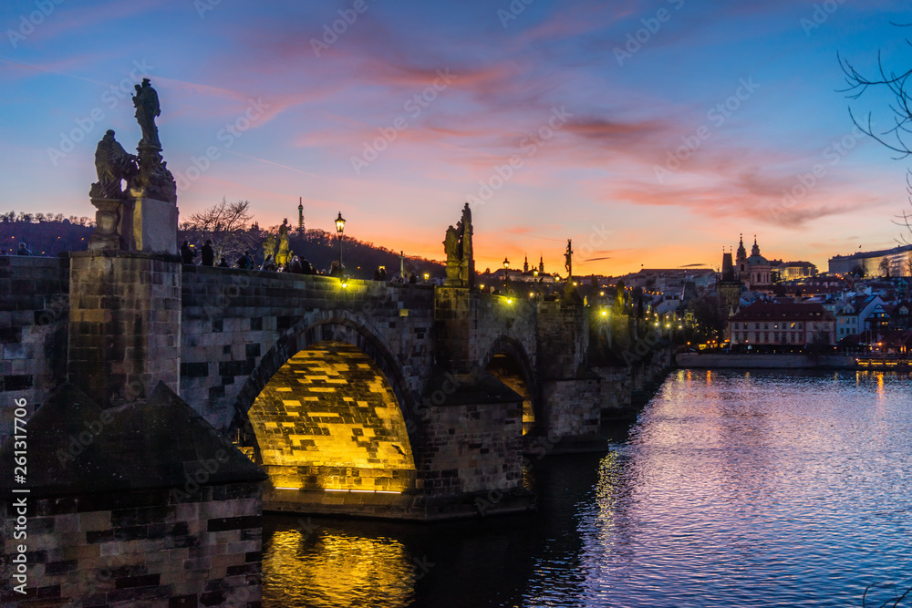 View on Charles bridge and Prague castle in Prague, Czech Republic, at sunset. Beautiful travel background