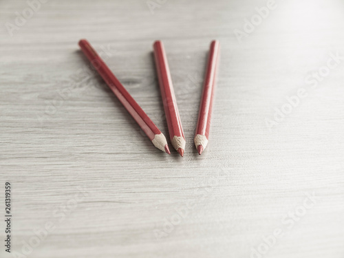 Fotografía Red pencils on wooden table. Back to school. Top view. Copy space