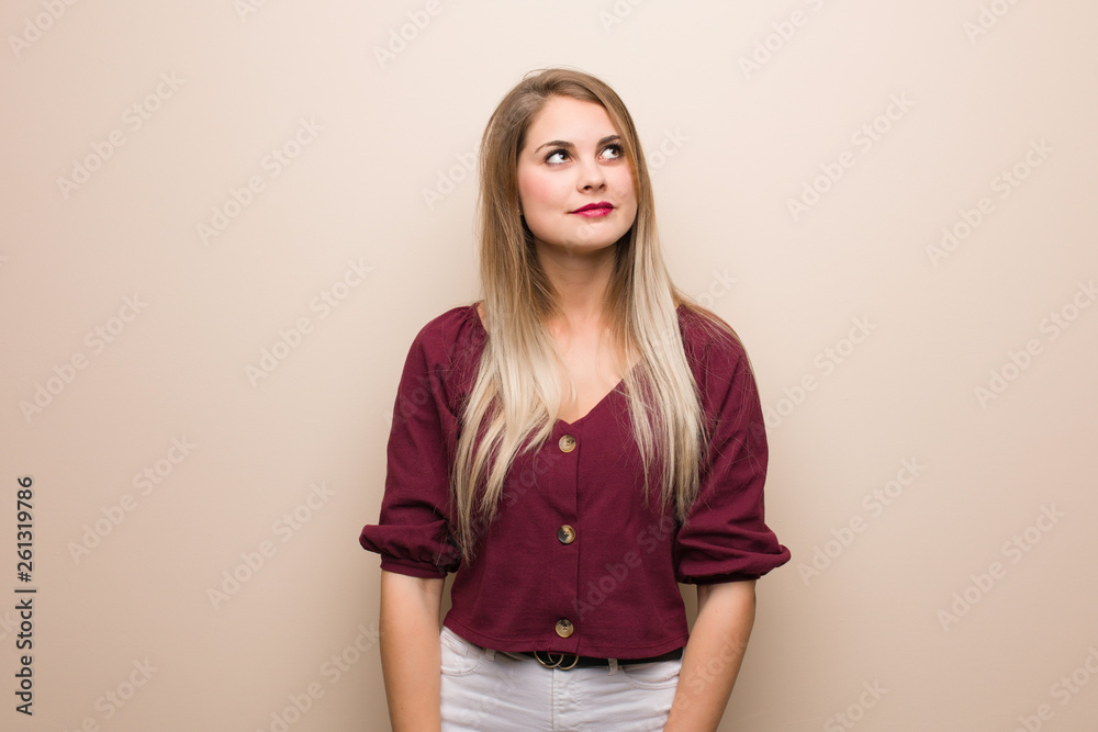Young russian woman dreaming of achieving goals and purposes Young russian woman dreaming of achieving goals and purposes