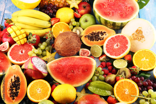 Fototapeta Naklejka Na Ścianę i Meble -  Tropical fruits background, many colorful ripe fresh tropical fruits