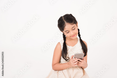 Female child using smart phone