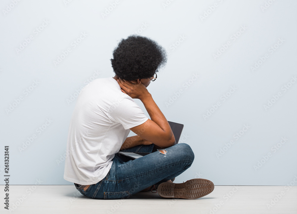 man sitting on ground