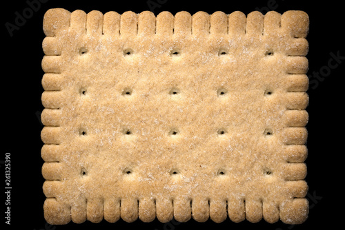 Cracker cookie isolated on black background