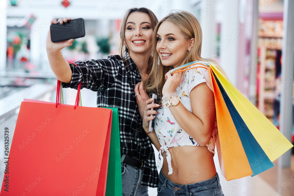 Pretty girls posing while shopping Pretty girls posing while shopping