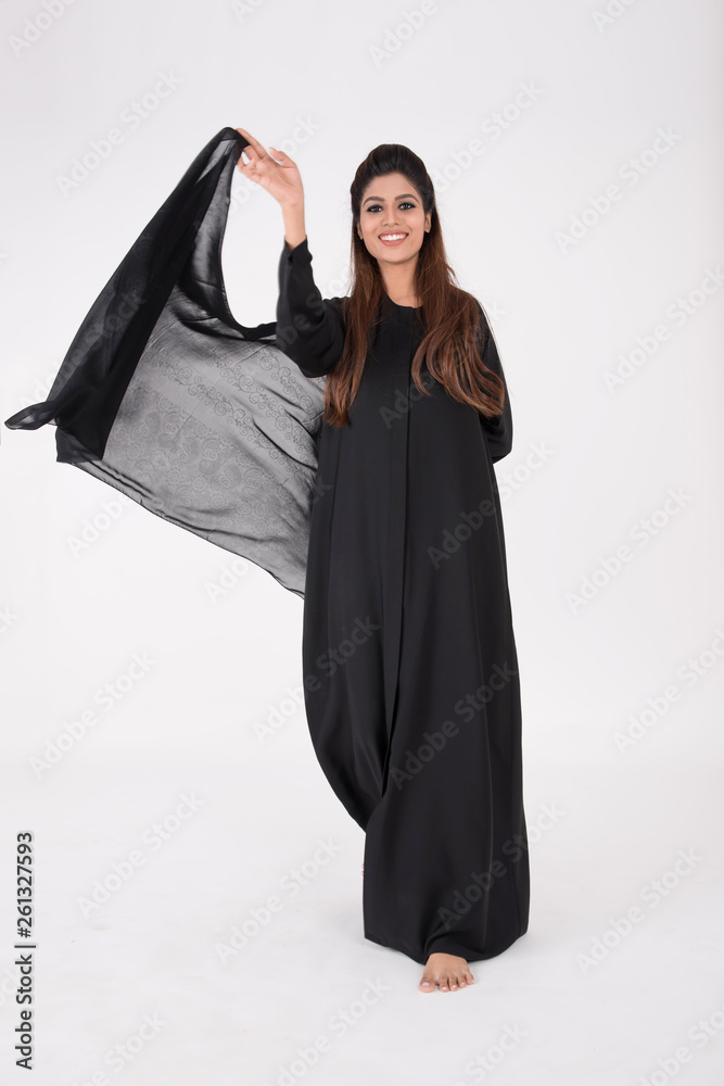Beautiful Arab woman in traditional dress dancing Beautiful Arab woman in traditional dress dancing