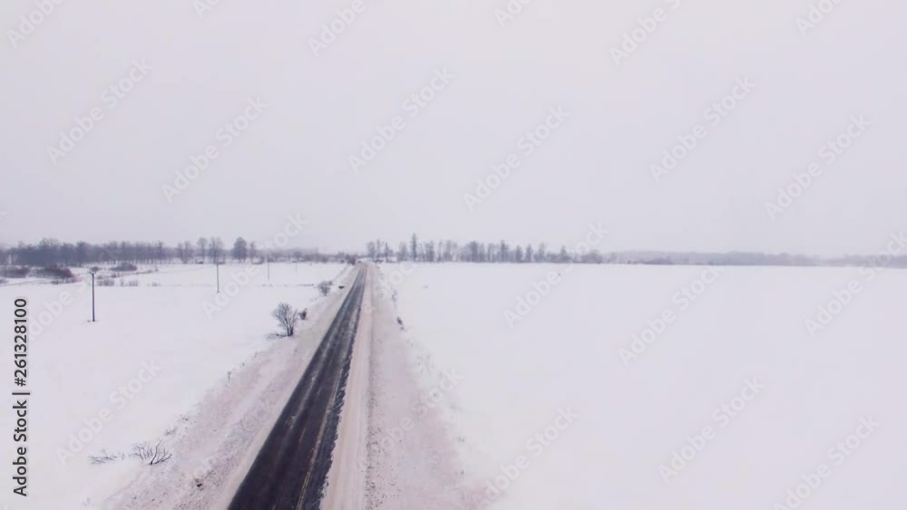 Road in winter field aerial Road in winter field aerial