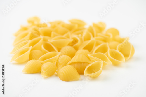 Raw pasta on white surface