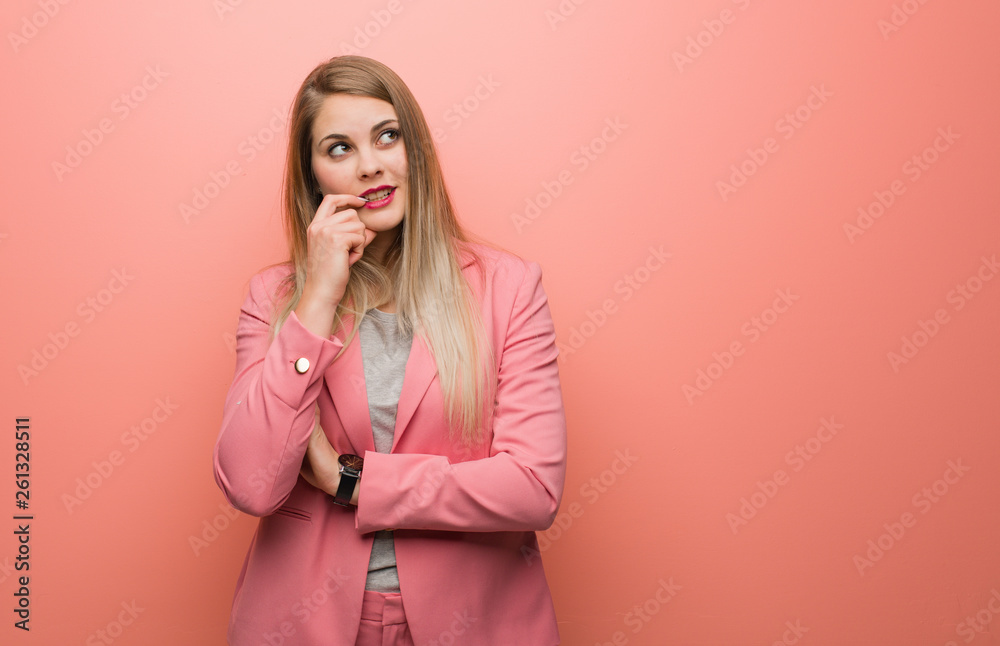 Young russian woman wearing pajama relaxed thinking about something looking at a copy space Young russian woman wearing pajama relaxed thinking about something looking at a copy space