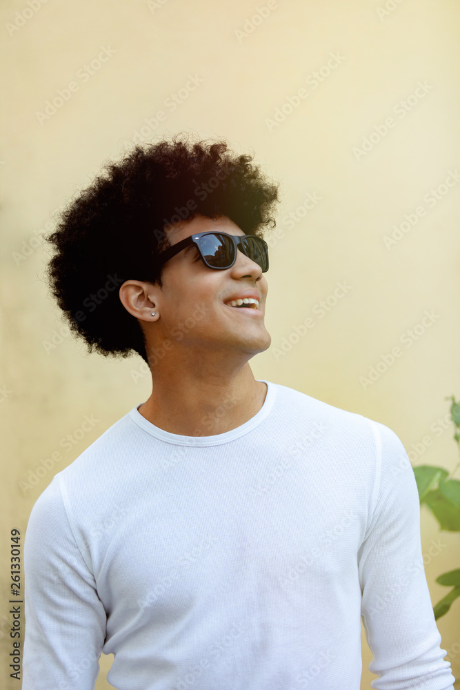 Handsome guy with afro hairstyle and sunglasses Handsome guy with afro hairstyle and sunglasses