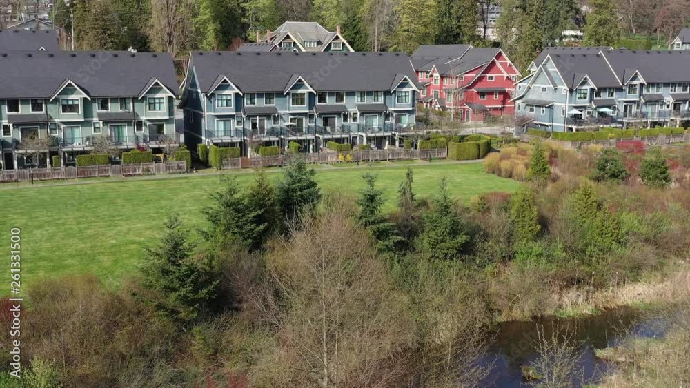 A perfect neighbourhood. Houses in suburb at Summer in the north America. Luxury houses with nice landscape. Aerial drone view. 4K. A perfect neighbourhood. Houses in suburb at Summer in the north America. Luxury houses with nice landscape. Aerial drone view. 4K.