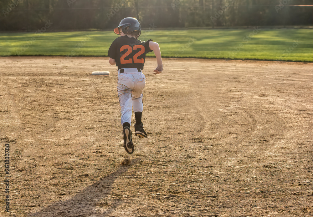 Youth Baseball Player Running
