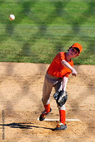 Youth Baseball Player Pitching