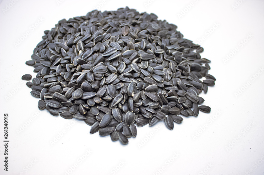 Ripe Sunflower Seeds On A White Background Ripe Sunflower Seeds On A White Background