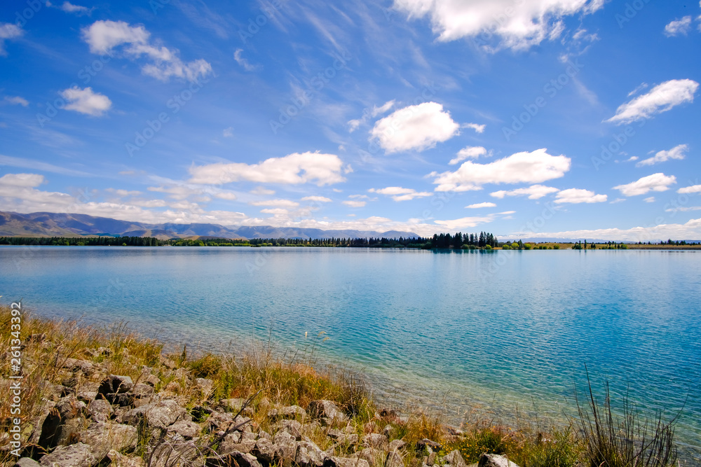 Wide angle shot of Lake Ruataniwha, South Island, New Zealand on a beautiful summer day.