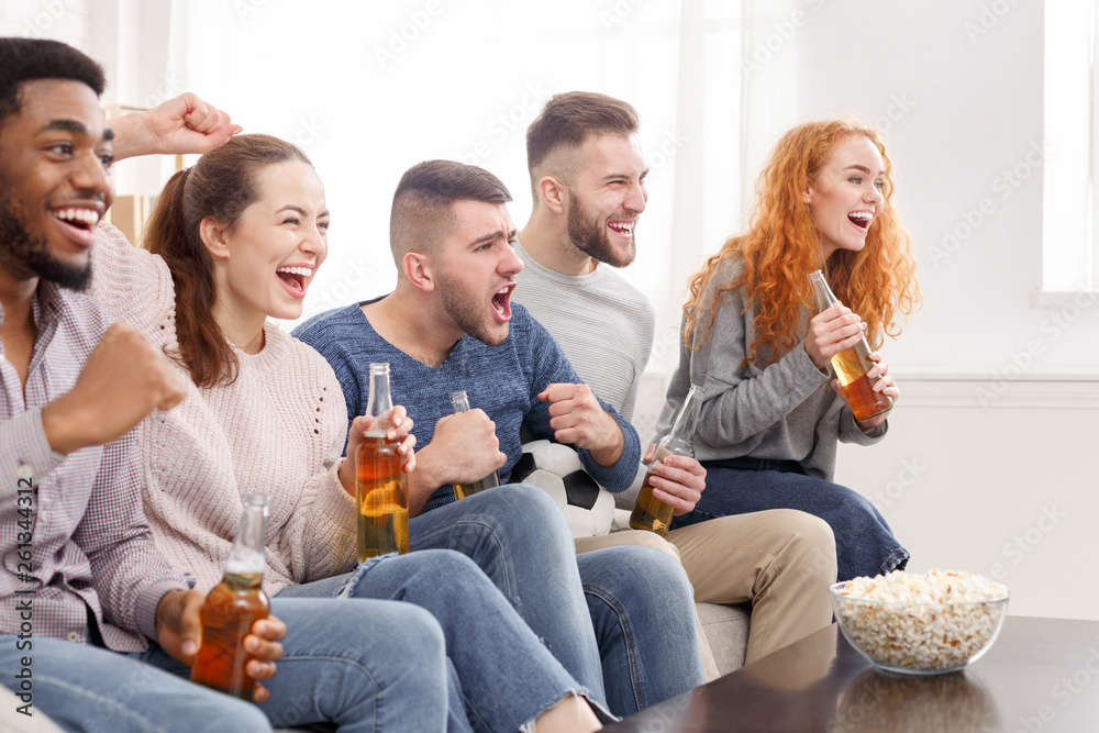 Cheering for favourite team. Friends watching match Cheering for favourite team. Friends watching match