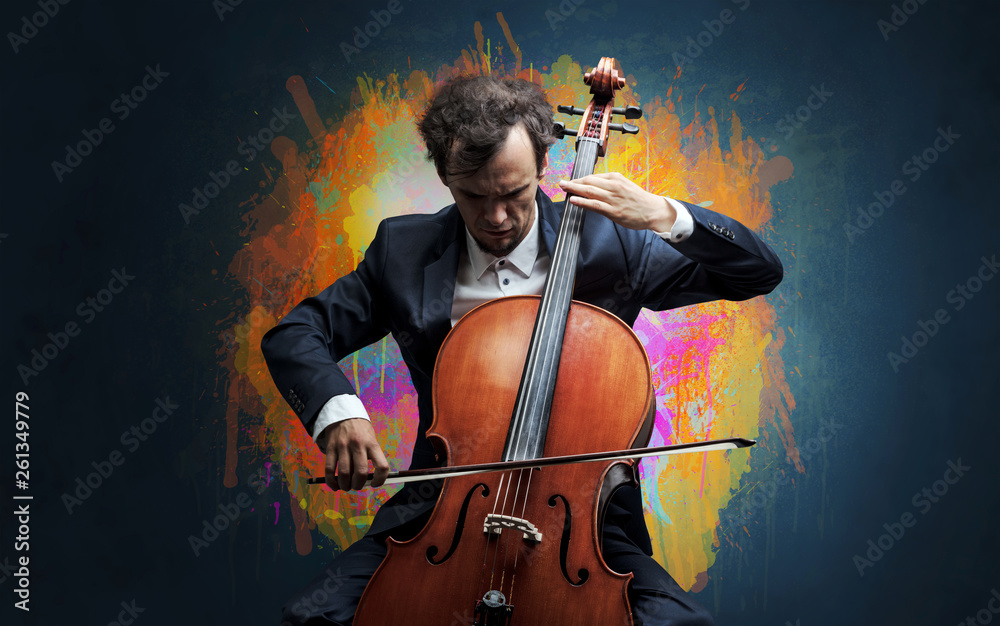 Young classical musician with colorful splotch wallpaper
