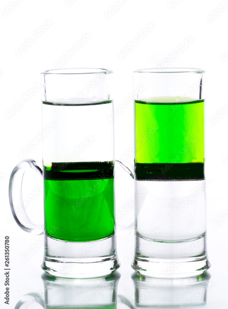 shots of colored layers of different alcohol shots of colored layers of different alcohol