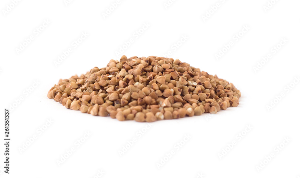 Side view of buckwheat groats heap isolated on white background Side view of buckwheat groats heap isolated on white background