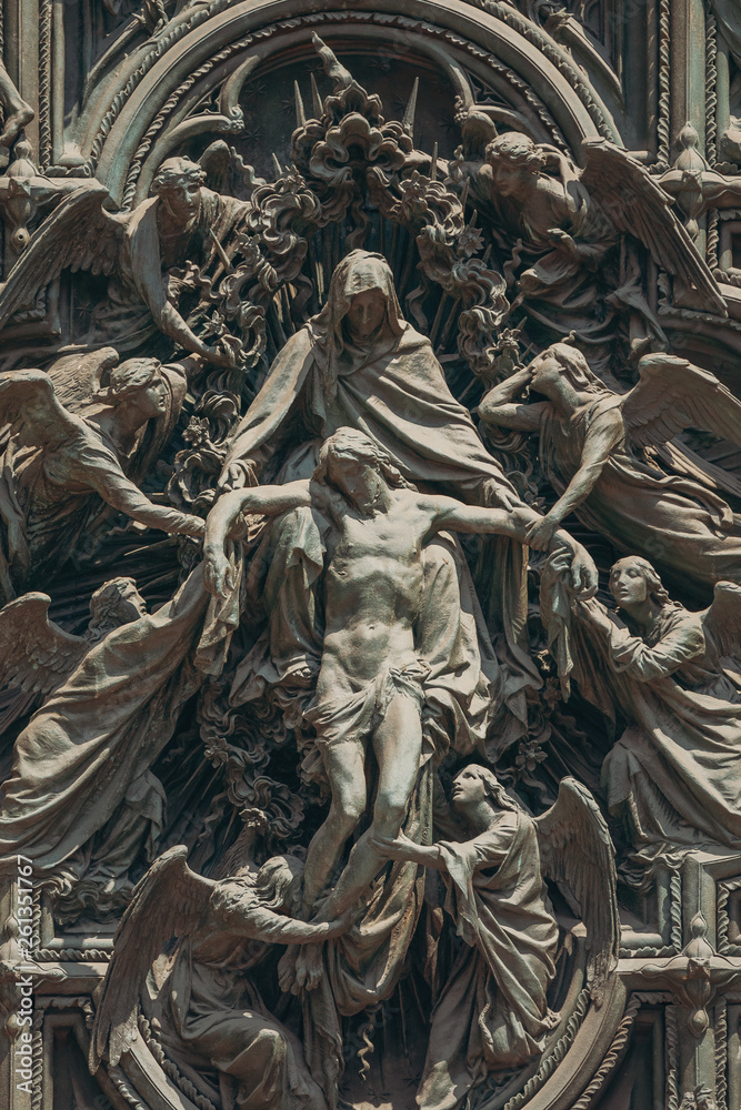 Milan, Italy Detail Of Facade Of Milan Cathedral Or Duomo Di Milano Is The Cathedral Church Of Milan, Italy. Christ Crucifix