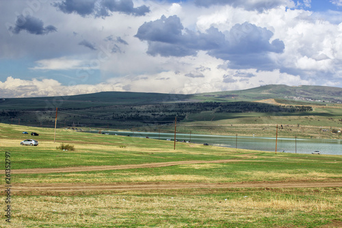 Beautiful landscape with a view of the river, mountains and blue sky. Tbilisi, Georgia.