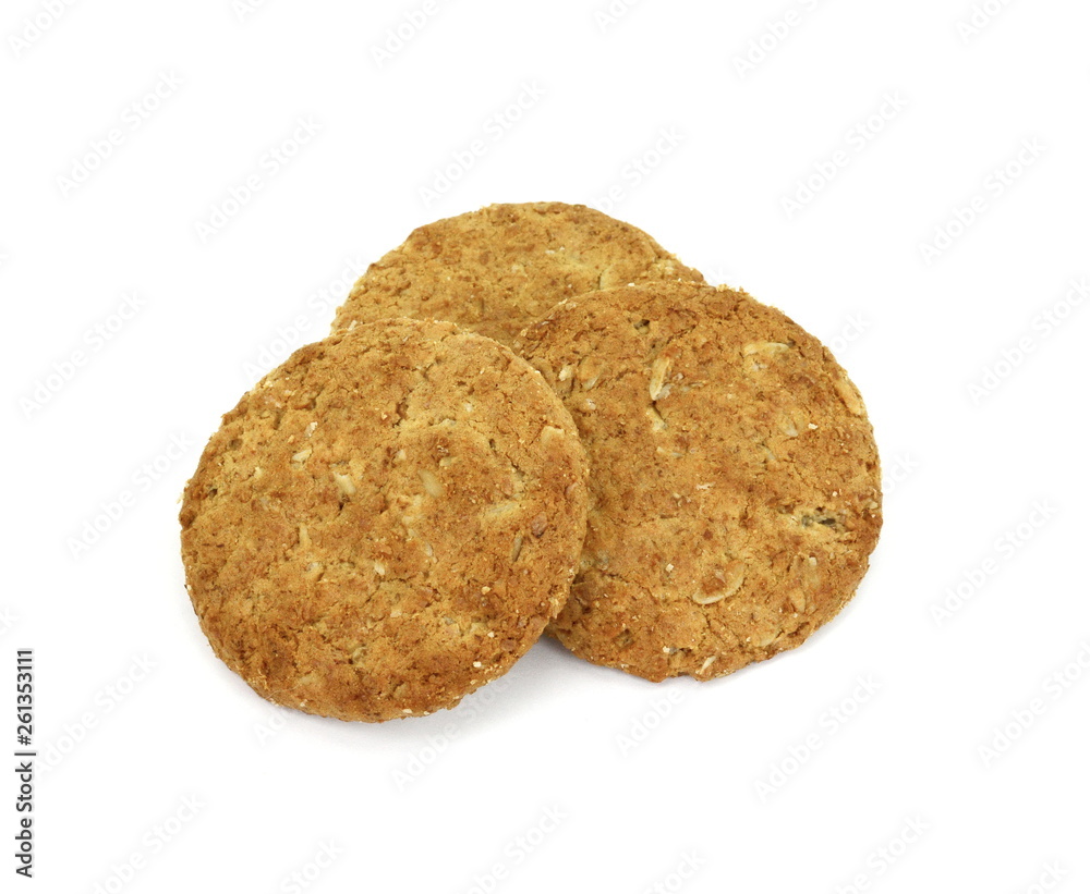 Round whole wheat biscuit, cookie with raisins isolated on white background. Biscuits with whole-wheat (wholemeal) flour isolated on white background Round whole wheat biscuit, cookie with raisins isolated on white background. Biscuits with whole-wheat (wholemeal) flour isolated on white background