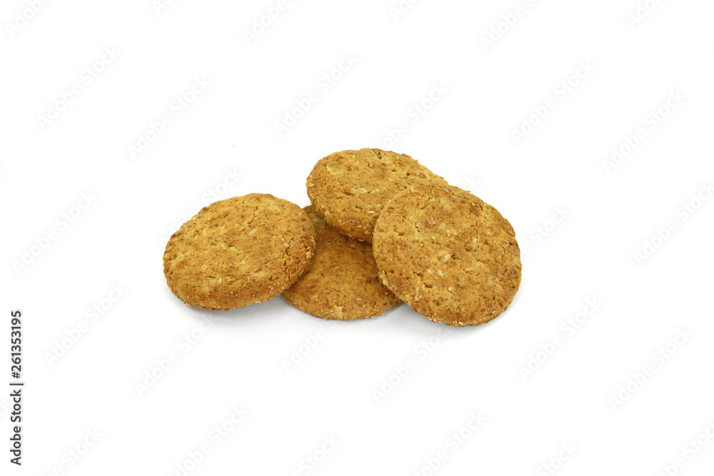 Round whole wheat biscuit, cookie with raisins isolated on white background. Biscuits with whole-wheat (wholemeal) flour isolated on white background Round whole wheat biscuit, cookie with raisins isolated on white background. Biscuits with whole-wheat (wholemeal) flour isolated on white background