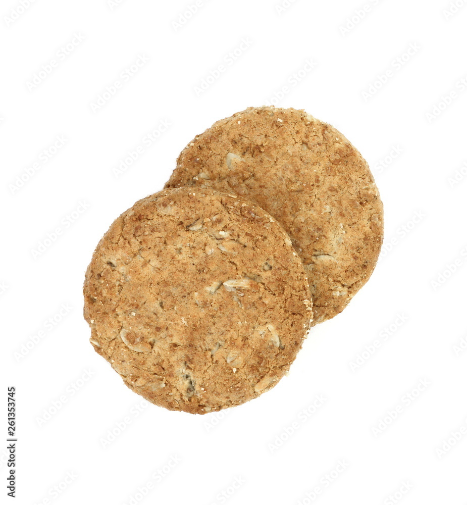 Round whole wheat biscuit, cookie with raisins isolated on white background. Biscuits with whole-wheat (wholemeal) flour isolated on white background Round whole wheat biscuit, cookie with raisins isolated on white background. Biscuits with whole-wheat (wholemeal) flour isolated on white background