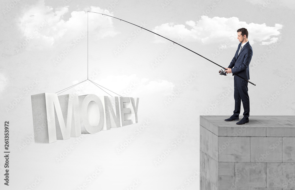 Young businessman fishing money, income from the top of a building
Young businessman fishing money, income from the top of a building