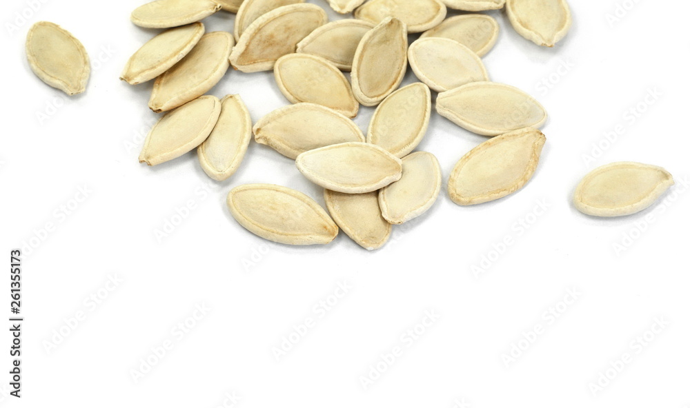 Heap of pumpkin seeds isolated on white background Heap of pumpkin seeds isolated on white background