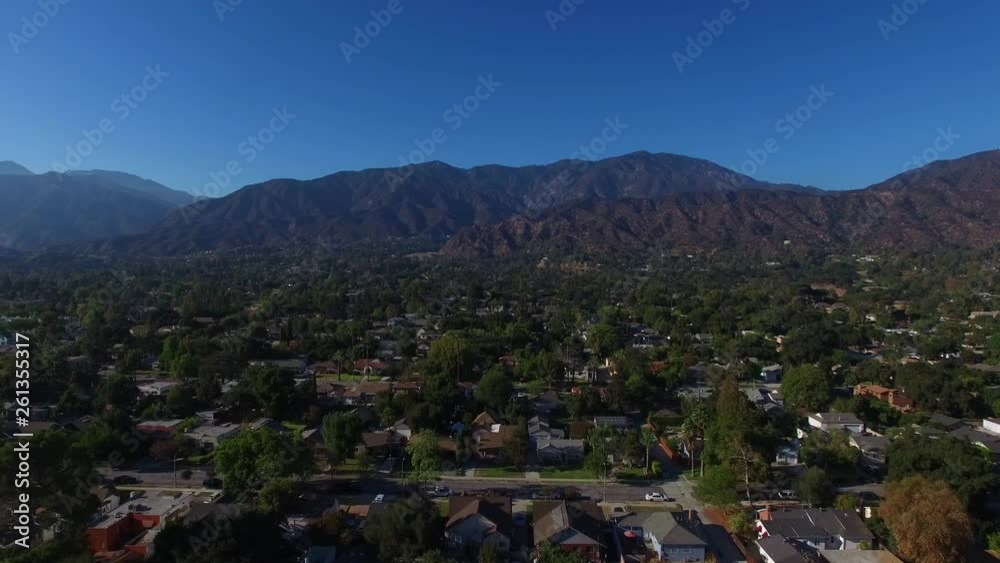 Aerial drone view of a city town with houses and streets Aerial drone view of a city town with houses and streets