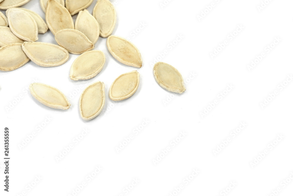 Heap of pumpkin seeds isolated on white background Heap of pumpkin seeds isolated on white background