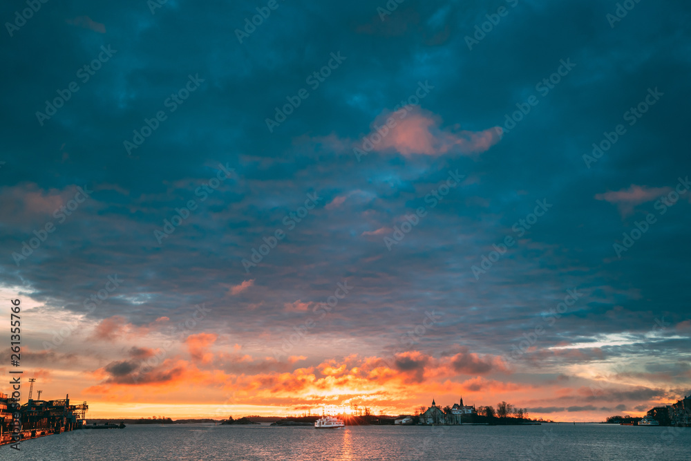 Helsinki, Finland. Touristic Boat Floating Near Valkosaari Island At Sunrise Sunset Time