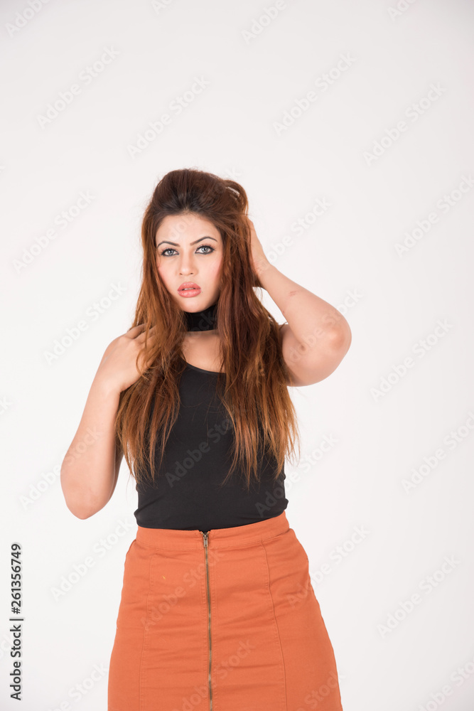 Pretty young female posing on white background Pretty young female posing on white background