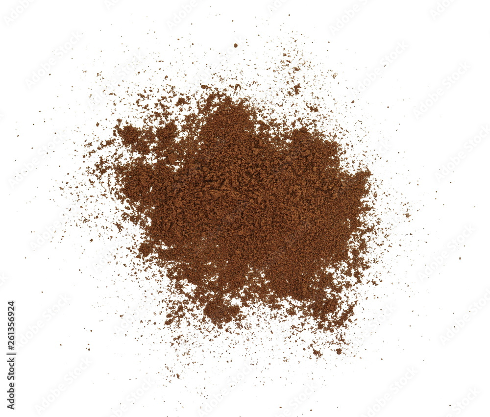 Coffee powder isolated of white background. A little coffee over a white surface. Milled coffee. Coffee powder isolated of white background. A little coffee over a white surface. Milled coffee.