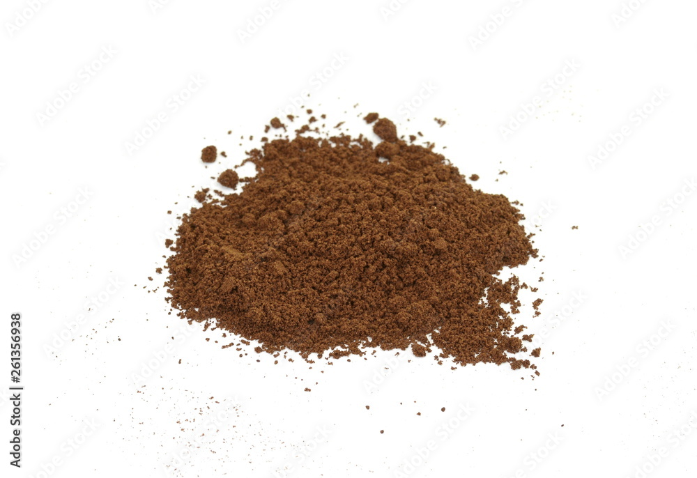 Coffee powder isolated of white background. A little coffee over a white surface. Milled coffee. Coffee powder isolated of white background. A little coffee over a white surface. Milled coffee.