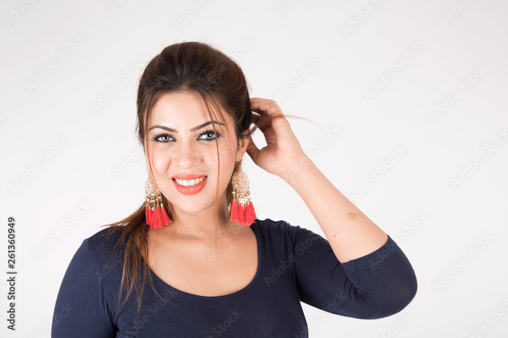 Portrait of pretty young female on white background