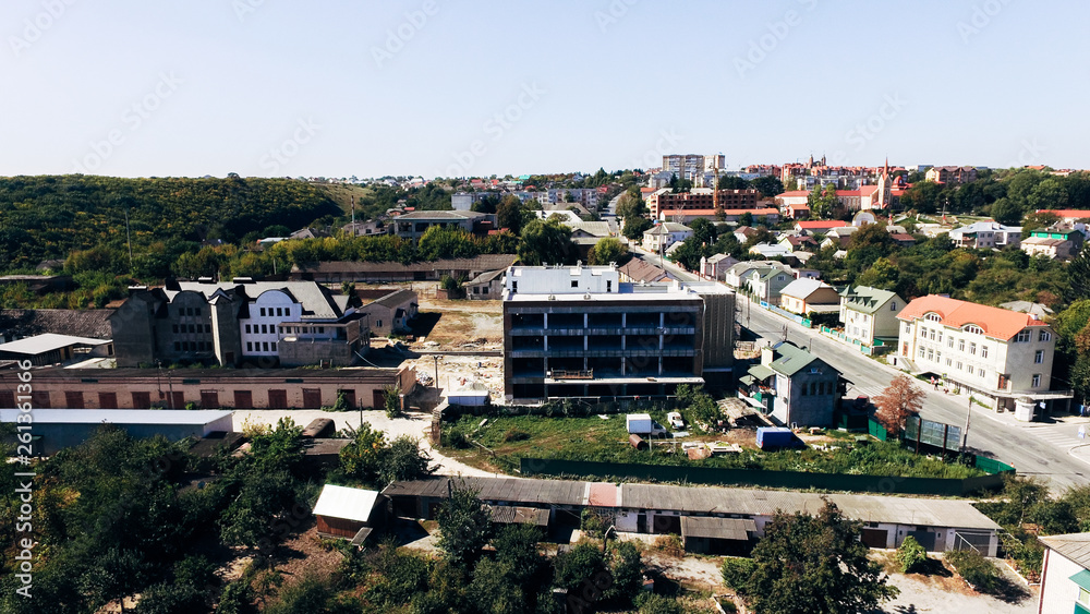 Fototapeta premium Aerial view of the building under construction in the city. Ukraine