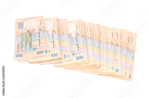 A lot of money, Ukrainian hryvnia on a white background with copy space. Shopping concept, banking and finance