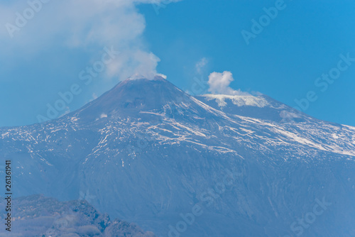 Mt. Etna Volcano Emitting Smoke on a Sunny Day © JonShore