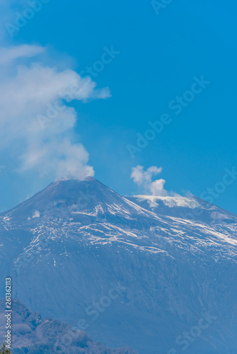 Mt. Etna Volcano Emitting Smoke on a Sunny Day © JonShore