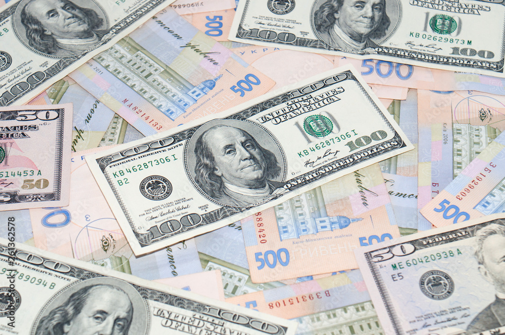 Money, dollars and hryvnia, close-up, top view. The concept of the dollar and the hryvnia, finance, banks. Money, dollars and hryvnia, close-up, top view. The concept of the dollar and the hryvnia, finance, banks.