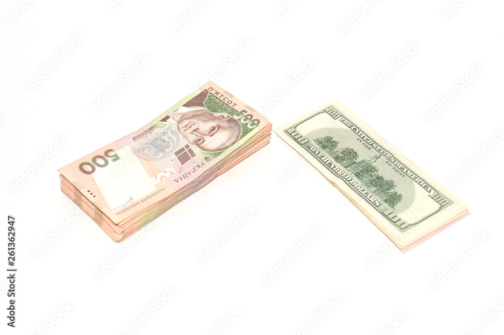 Ukrainian hryvnia and the dollar on a white background, isolate. Problems in the economy, inflation Ukrainian hryvnia and the dollar on a white background, isolate. Problems in the economy, inflation